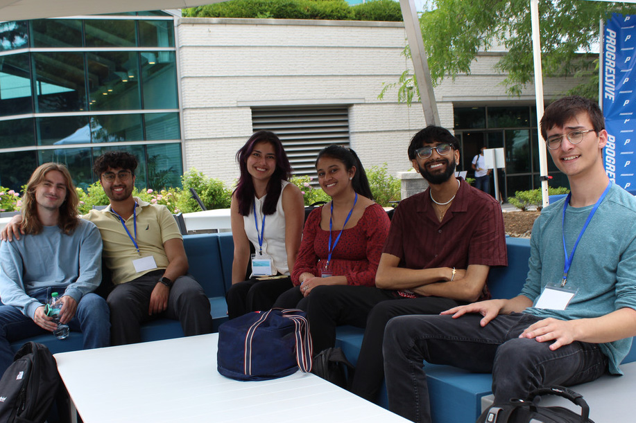 Internship - Progressive Group of student interns seated outside of Progressive Insurance Headquarters