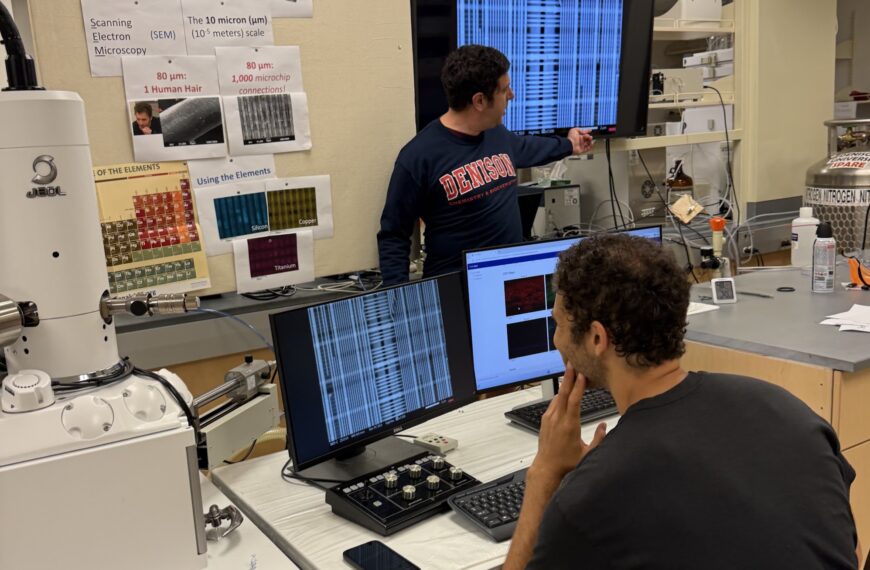 Denison Professor, Joe Reczek, works with a student in a semiconductor lab